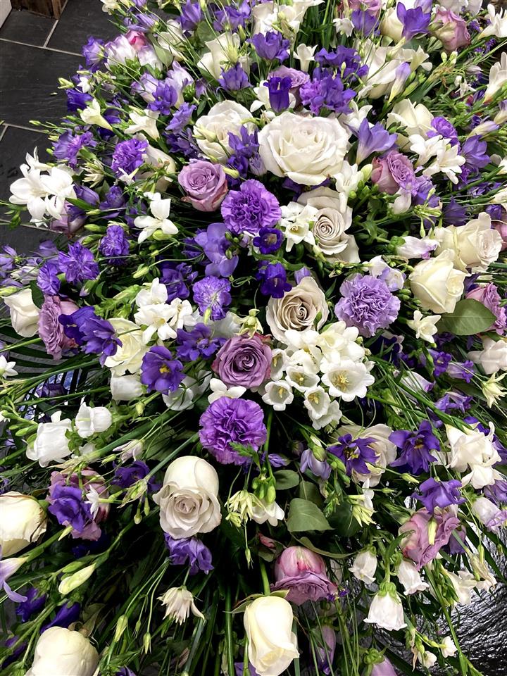 Sympathy funeral flowers Cornwall casket spray Helston